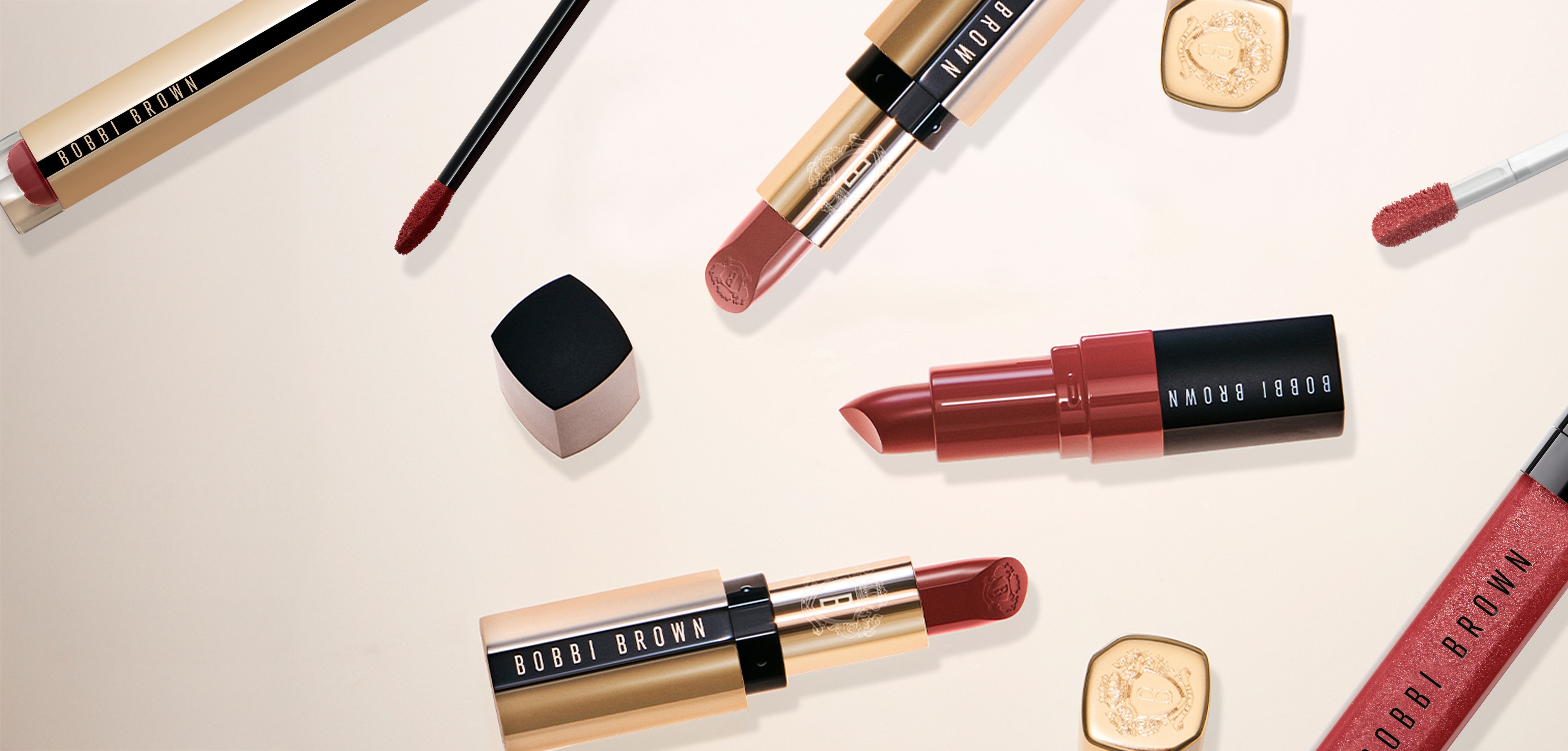 Lipsticks scattered with lid off
